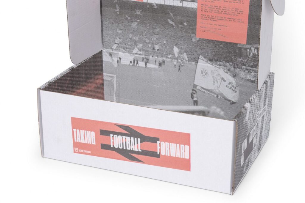 white mailer box with lid open showing fully printed design